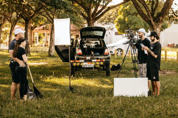 men using reflector for portrait photography 