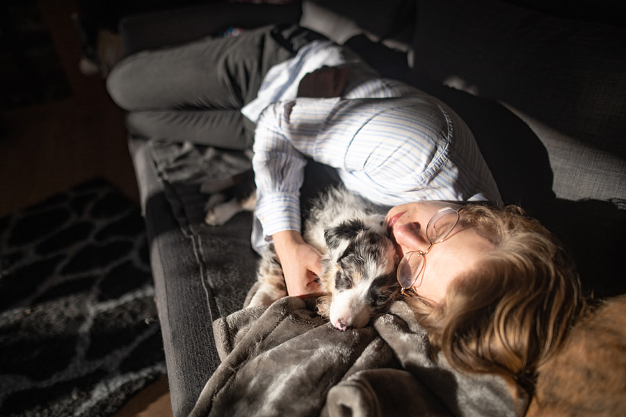 Young men during a nap with a puppy by Iza ?yso? on 500px.com