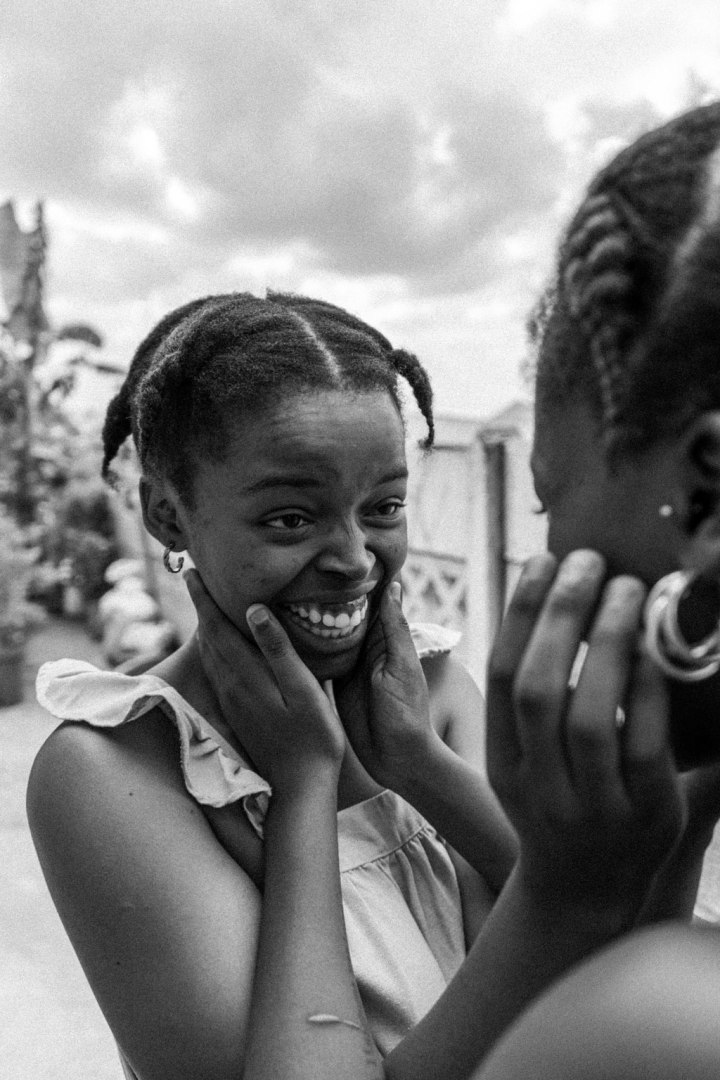 Two young South African friends goofing around outside